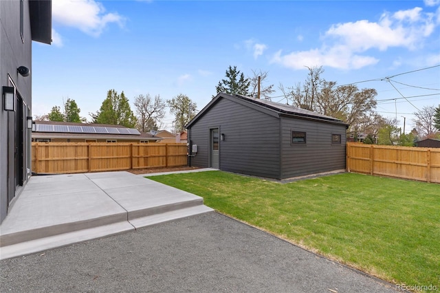 2610 N Monroe St, Denver, CO 80205 - view of yard featuring a patio and an outbuilding