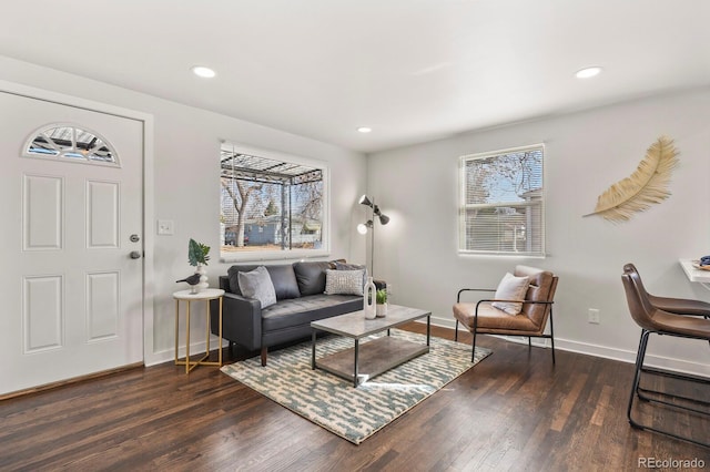 living room featuring baseboards, dark wood-style flooring, and recessed lighting