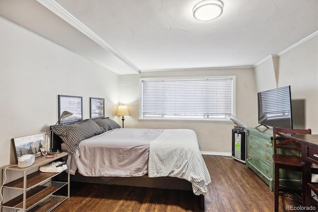 bedroom featuring crown molding and dark hardwood / wood-style floors