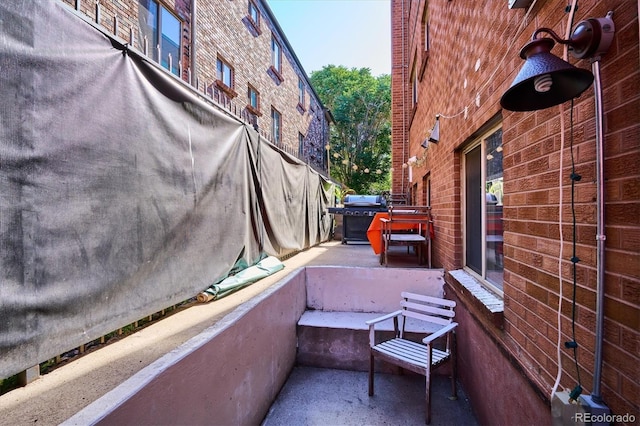 view of property exterior with a patio