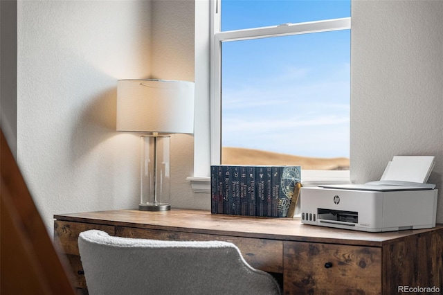 room details with white microwave and a textured wall