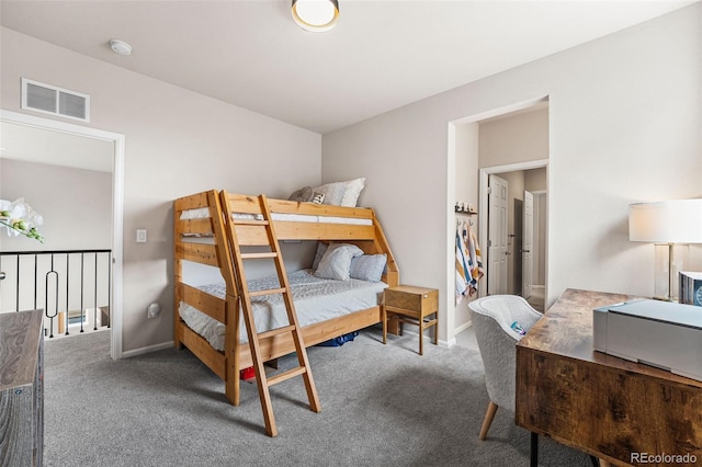 bedroom with baseboards, visible vents, and carpet floors