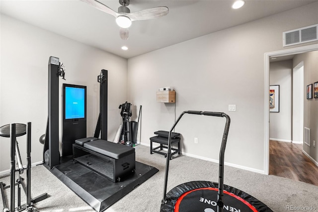 exercise room featuring recessed lighting, visible vents, ceiling fan, and carpet floors
