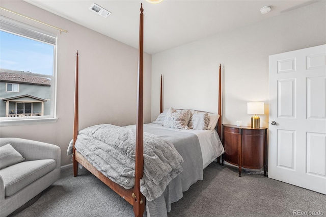 carpeted bedroom with visible vents