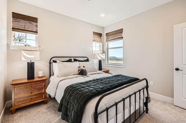 bedroom with carpet flooring, baseboards, and recessed lighting