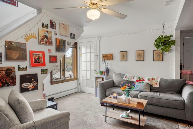 2087 S Grant St, Denver, CO 80210 - carpeted living room featuring a baseboard heating unit and a ceiling fan