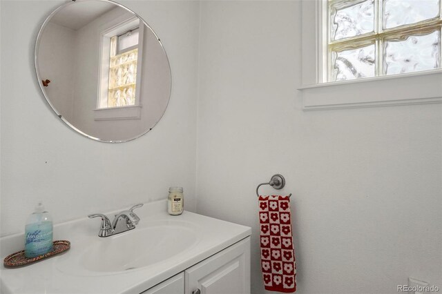 2087 S Grant St, Denver, CO 80210 - bathroom featuring a wealth of natural light and vanity