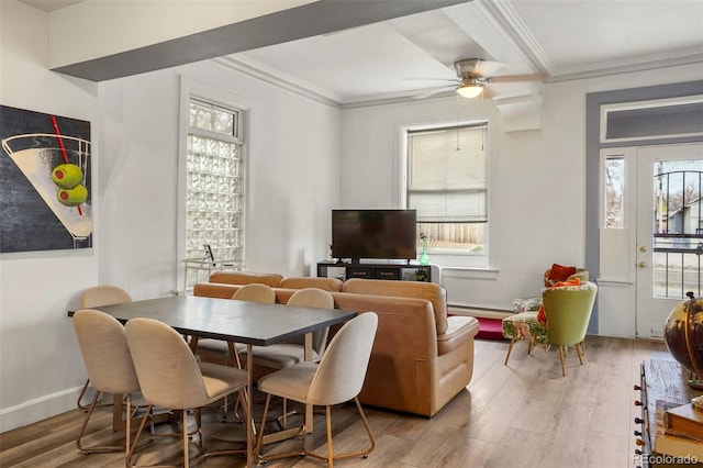 2087 S Grant St, Denver, CO 80210 - dining space with light wood-style floors, baseboards, crown molding, and a ceiling fan