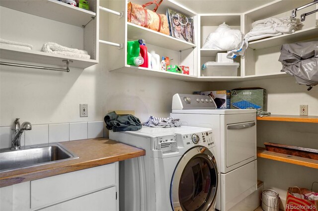 2087 S Grant St, Denver, CO 80210 - laundry room with independent washer and dryer, laundry area, and a sink