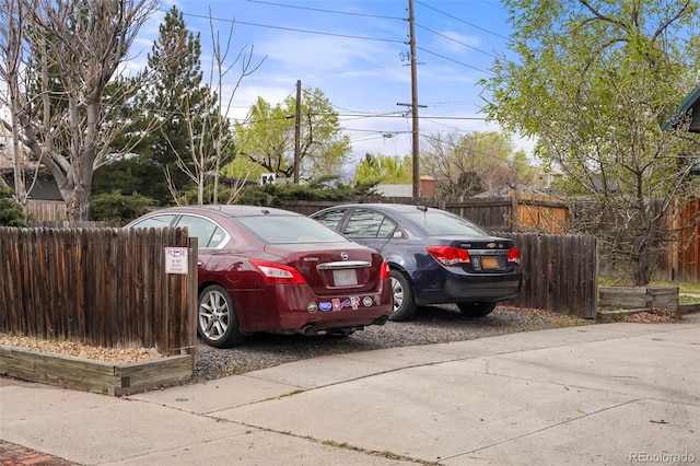 2087 S Grant St, Denver, CO 80210 - view of vehicle parking with fence