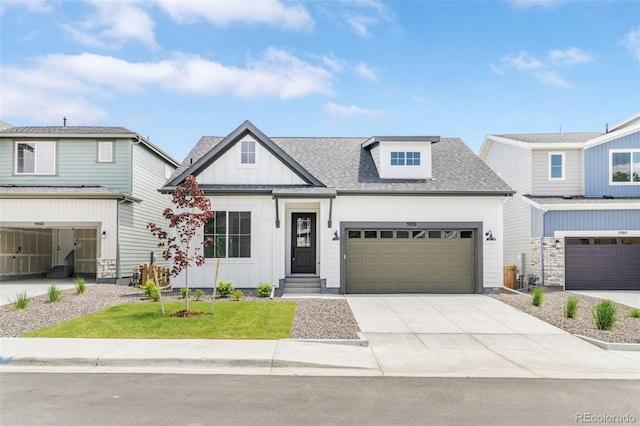 5970 S Platte Canyon Dr, Littleton, CO 80123 - modern inspired farmhouse featuring board and batten siding, driveway, roof with shingles, a garage, and a front lawn