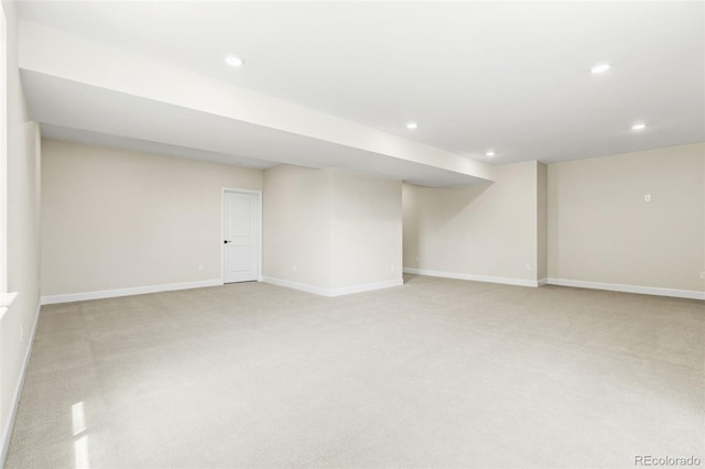 5970 S Platte Canyon Dr, Littleton, CO 80123 - finished below grade area featuring light carpet, recessed lighting, and baseboards