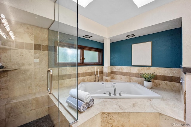 12570 W 60th Ave, Arvada, CO 80004 - bathroom featuring a bath and a shower stall