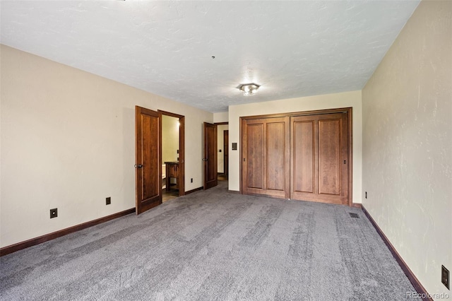 12570 W 60th Ave, Arvada, CO 80004 - unfurnished bedroom featuring light colored carpet and baseboards