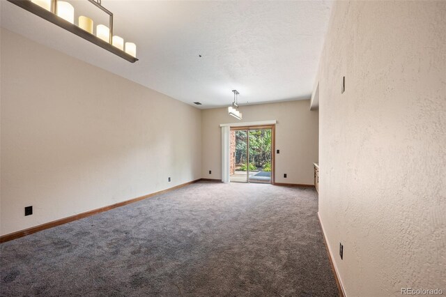 12570 W 60th Ave, Arvada, CO 80004 - unfurnished room featuring carpet, baseboards, and a textured wall
