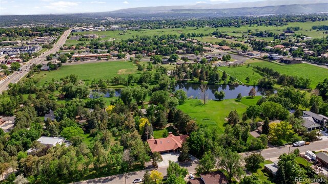 12570 W 60th Ave, Arvada, CO 80004 - aerial overview of property's location with a water and mountain view