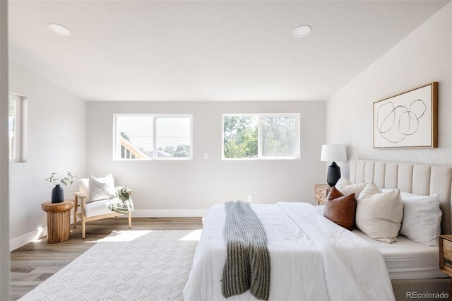 bedroom with light wood-type flooring