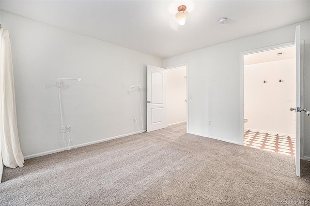 unfurnished room with carpet flooring