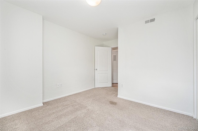 empty room featuring carpet