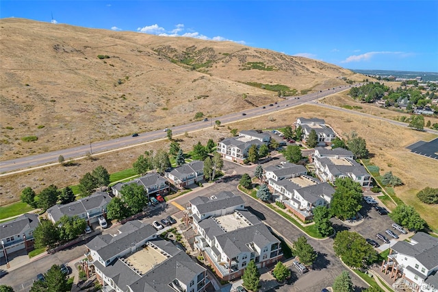 drone / aerial view featuring a mountain view