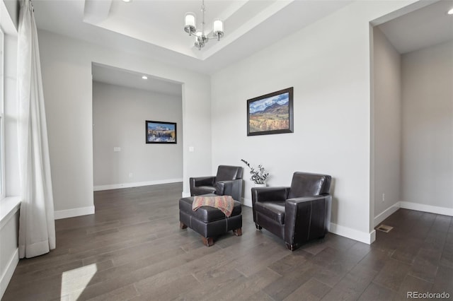 8803 Antero Ct, Arvada, CO 80007 - sitting room with dark wood-style flooring, a chandelier, recessed lighting, baseboards, and a raised ceiling