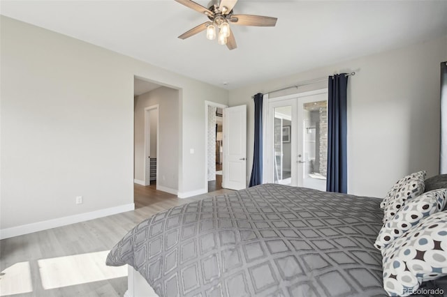 8803 Antero Ct, Arvada, CO 80007 - bedroom featuring french doors, access to exterior, wood finished floors, baseboards, and a ceiling fan
