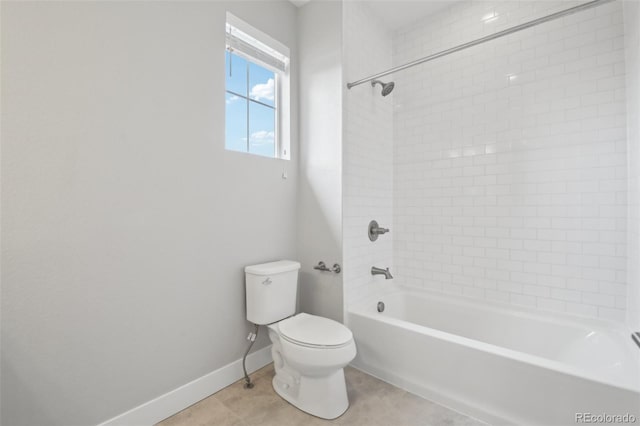 8803 Antero Ct, Arvada, CO 80007 - bathroom with toilet, tile patterned flooring, shower / bath combination, and baseboards