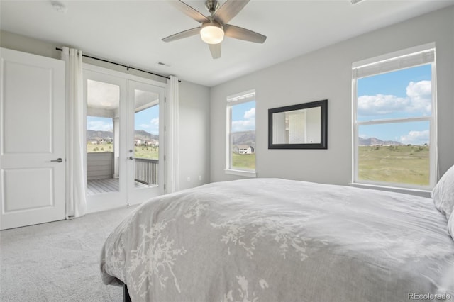 8803 Antero Ct, Arvada, CO 80007 - bedroom with access to outside, carpet floors, and a ceiling fan