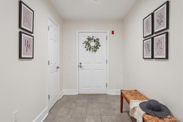 300 Hudson St Unit 109, Denver, CO 80220 - foyer featuring light tile patterned flooring and baseboards