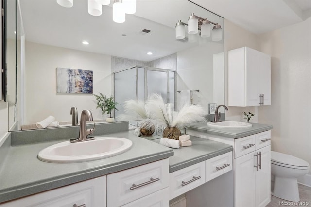 300 Hudson St Unit 109, Denver, CO 80220 - full bath with double vanity, a stall shower, toilet, and recessed lighting
