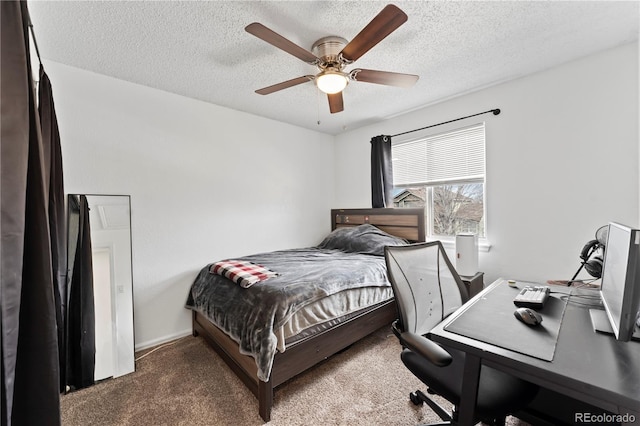 12119 Forest St, Thornton, CO 80241 - carpeted bedroom with a desk, a textured ceiling, attic access, and ceiling fan
