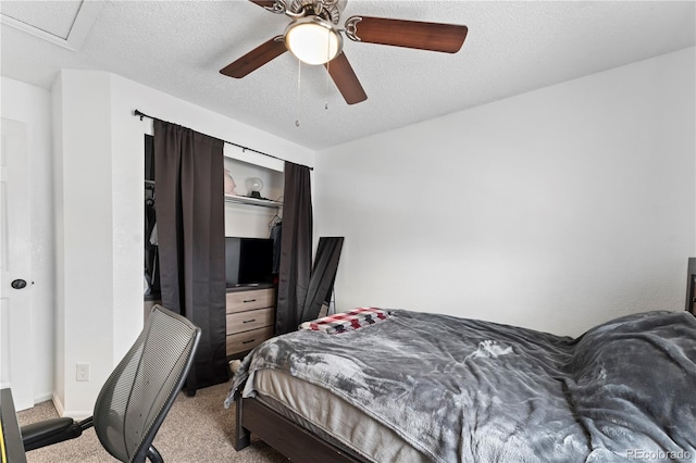 12119 Forest St, Thornton, CO 80241 - carpeted bedroom with ceiling fan and a textured ceiling