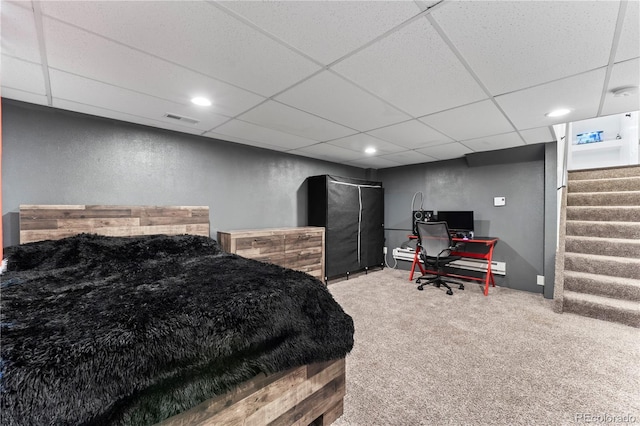 12119 Forest St, Thornton, CO 80241 - carpeted bedroom with a paneled ceiling, recessed lighting, and a textured wall