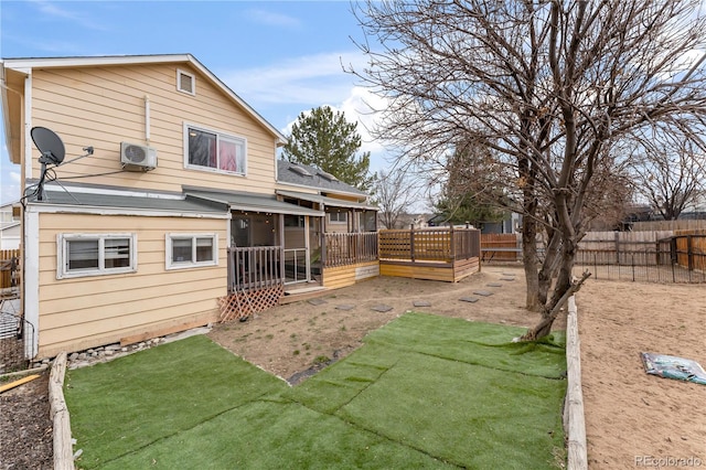 12119 Forest St, Thornton, CO 80241 - rear view of property with a sunroom and a deck