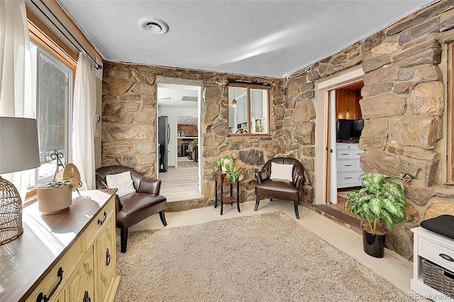 sitting room featuring visible vents