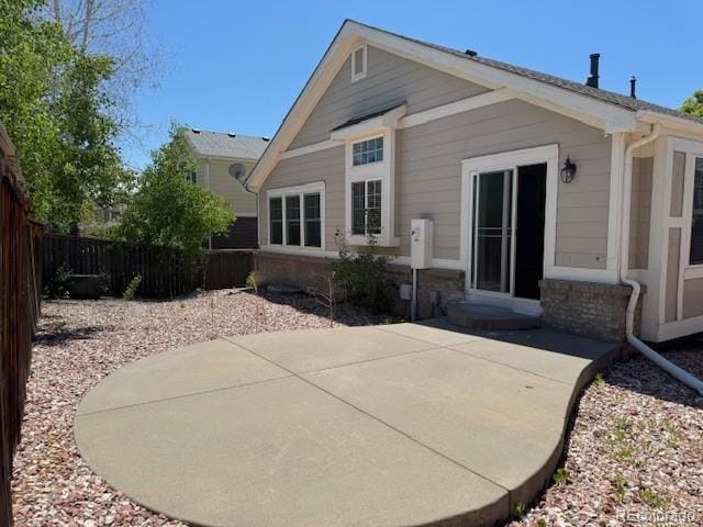 20148 E Dartmouth Dr, Aurora, CO 80013 - rear view of property featuring a patio area