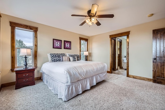 bedroom with ceiling fan and light colored carpet