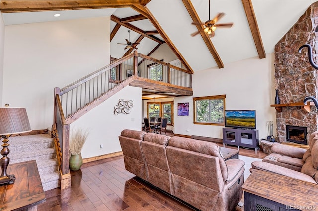 1424 Bluestem Way, Fairplay, CO 80440 - living room featuring stairway, high vaulted ceiling, wood finished floors, beamed ceiling, and ceiling fan