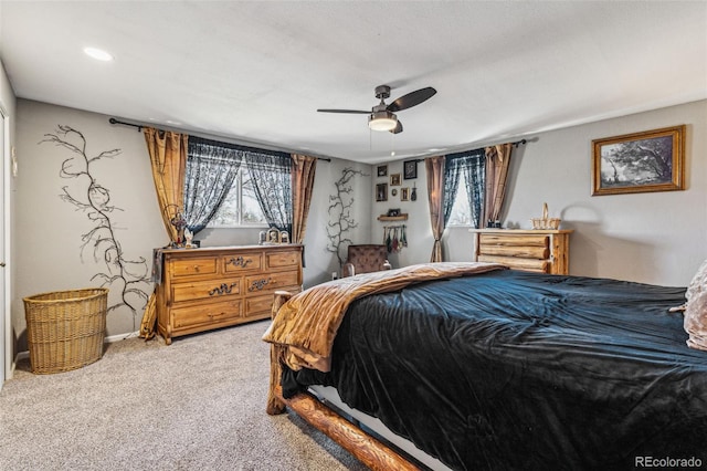 carpeted bedroom with a ceiling fan, recessed lighting, and baseboards