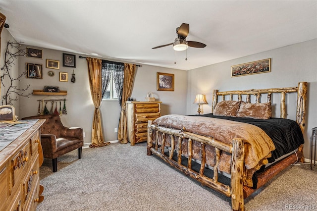 carpeted bedroom featuring ceiling fan and baseboards