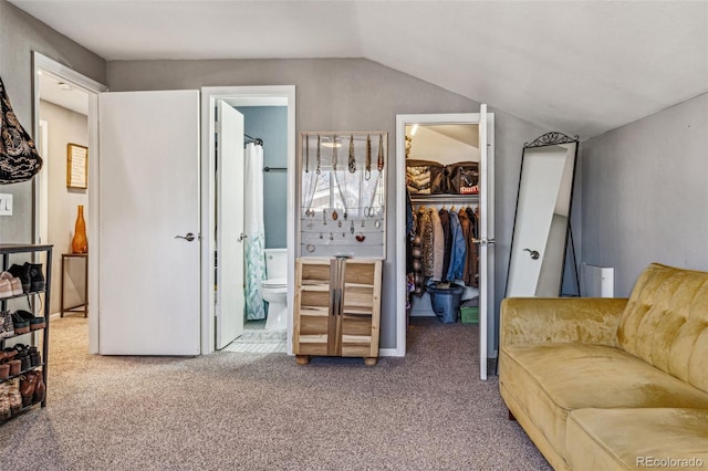 interior space with carpet floors and vaulted ceiling