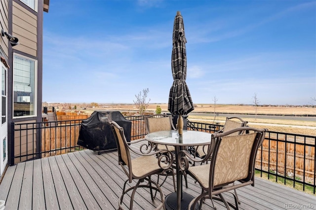 deck featuring outdoor dining area