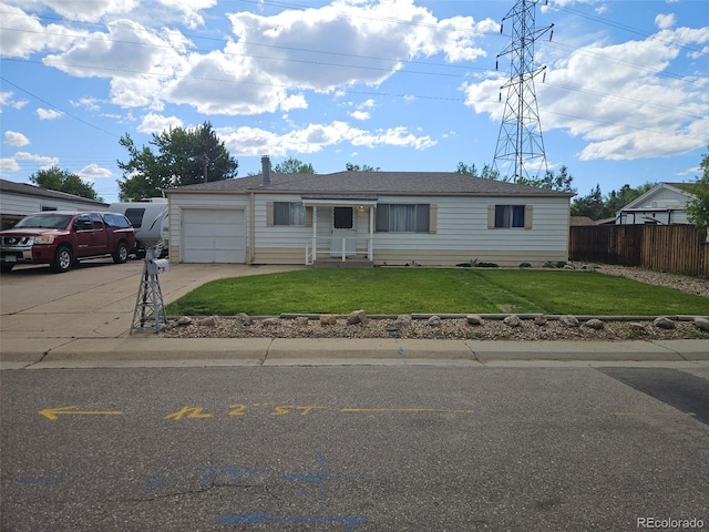3905 Nelson St, Wheat Ridge, CO 80033 - ranch-style house featuring a garage and driveway
