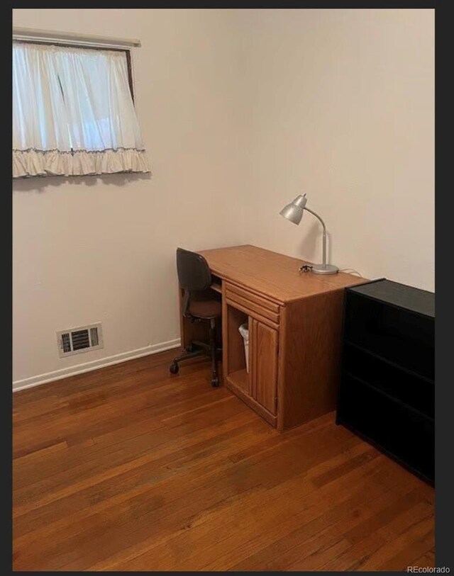 3905 Nelson St, Wheat Ridge, CO 80033 - unfurnished office with wood finished floors and baseboards