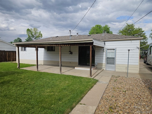 3905 Nelson St, Wheat Ridge, CO 80033 - rear view of house featuring a patio