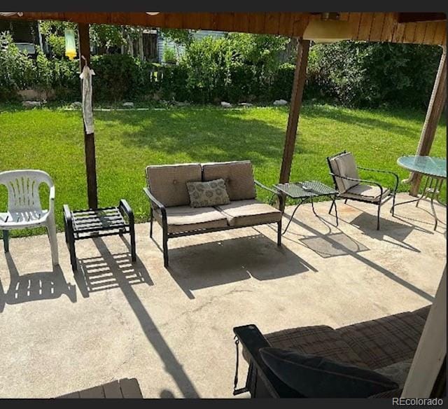 3905 Nelson St, Wheat Ridge, CO 80033 - view of patio / terrace featuring outdoor lounge area and a pergola
