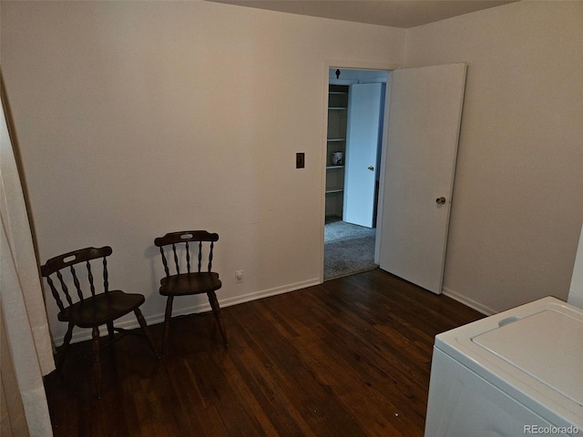 3905 Nelson St, Wheat Ridge, CO 80033 - living area with wood finished floors, baseboards, and washer / clothes dryer