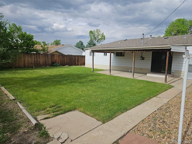 3905 Nelson St, Wheat Ridge, CO 80033 - view of yard featuring a patio