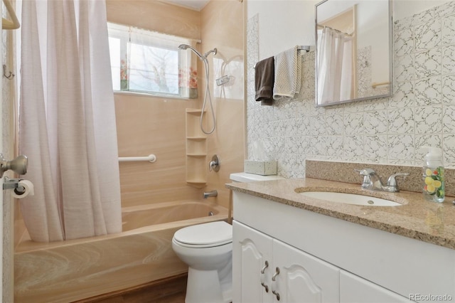 full bathroom featuring toilet, tile walls, vanity, shower / bath combo, and decorative backsplash