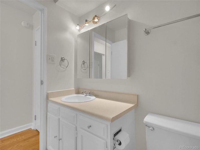 3144 S Wheeling Way Unit 206, Aurora, CO 80014 - bathroom with vanity and wood finished floors